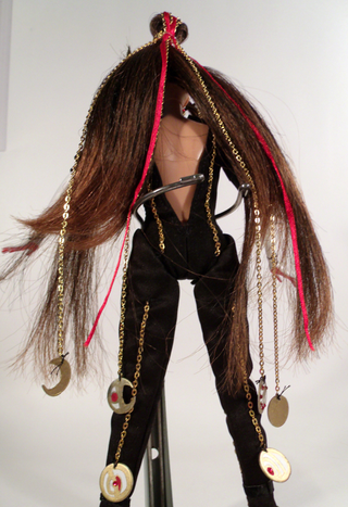 Illustration for article titled Bayonetta Barbie